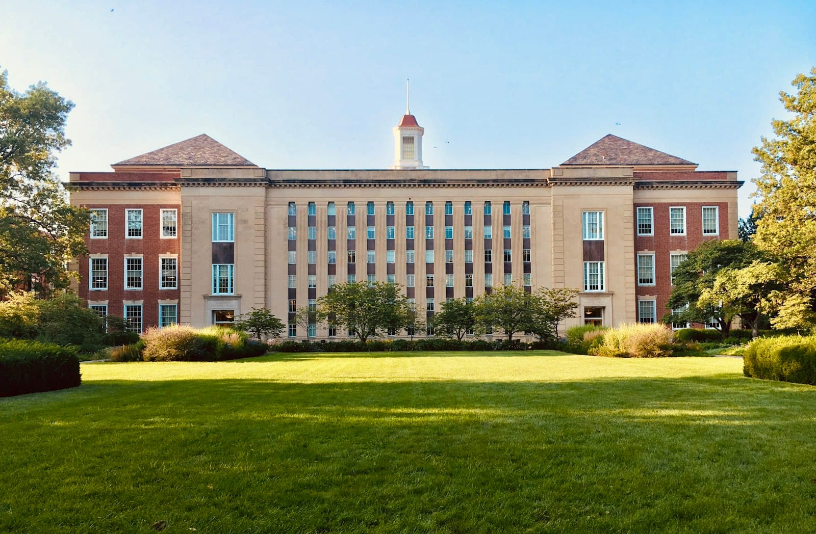 UK university campus building across a lawn