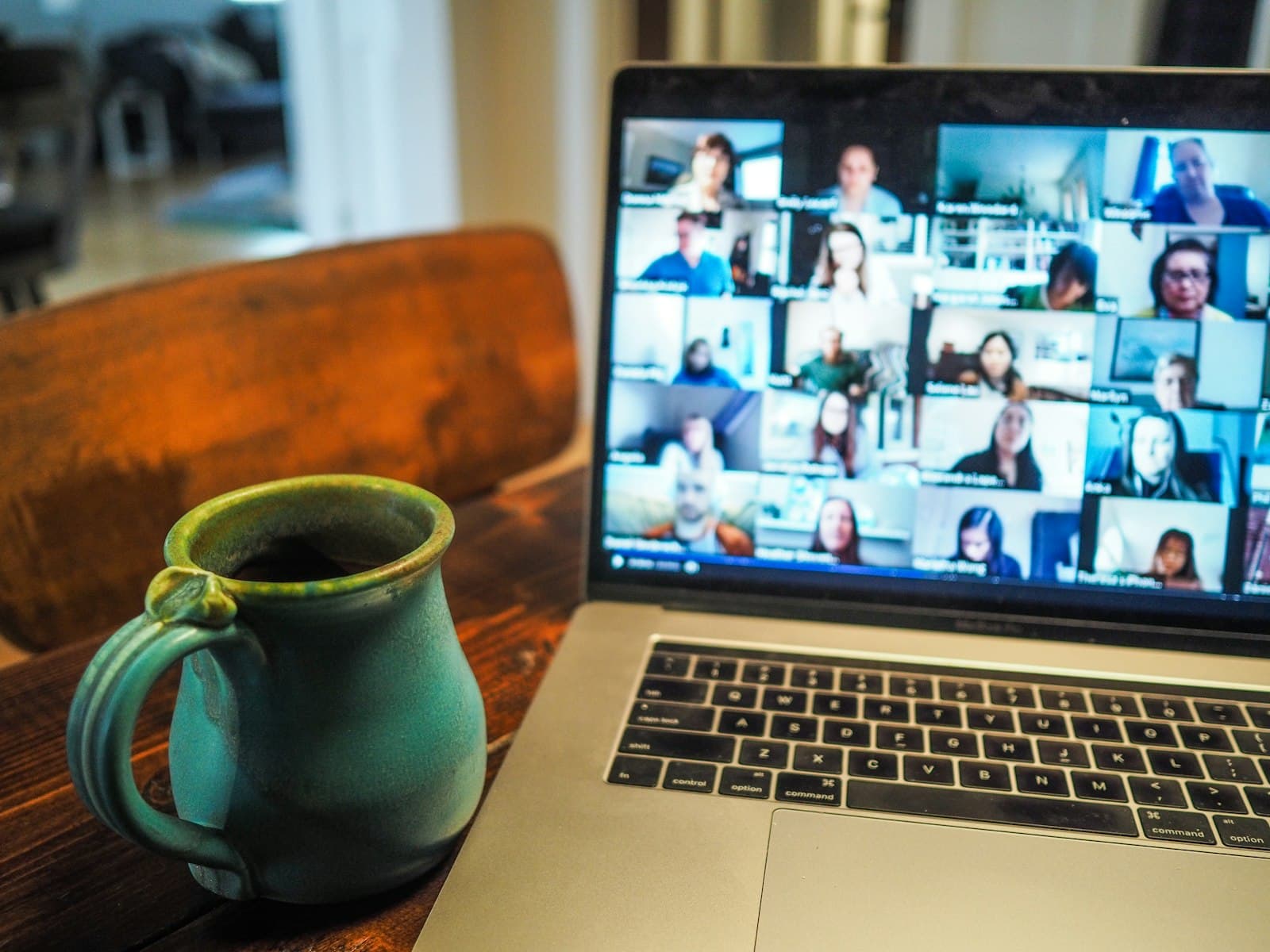 Live online class on a laptop beside a mug