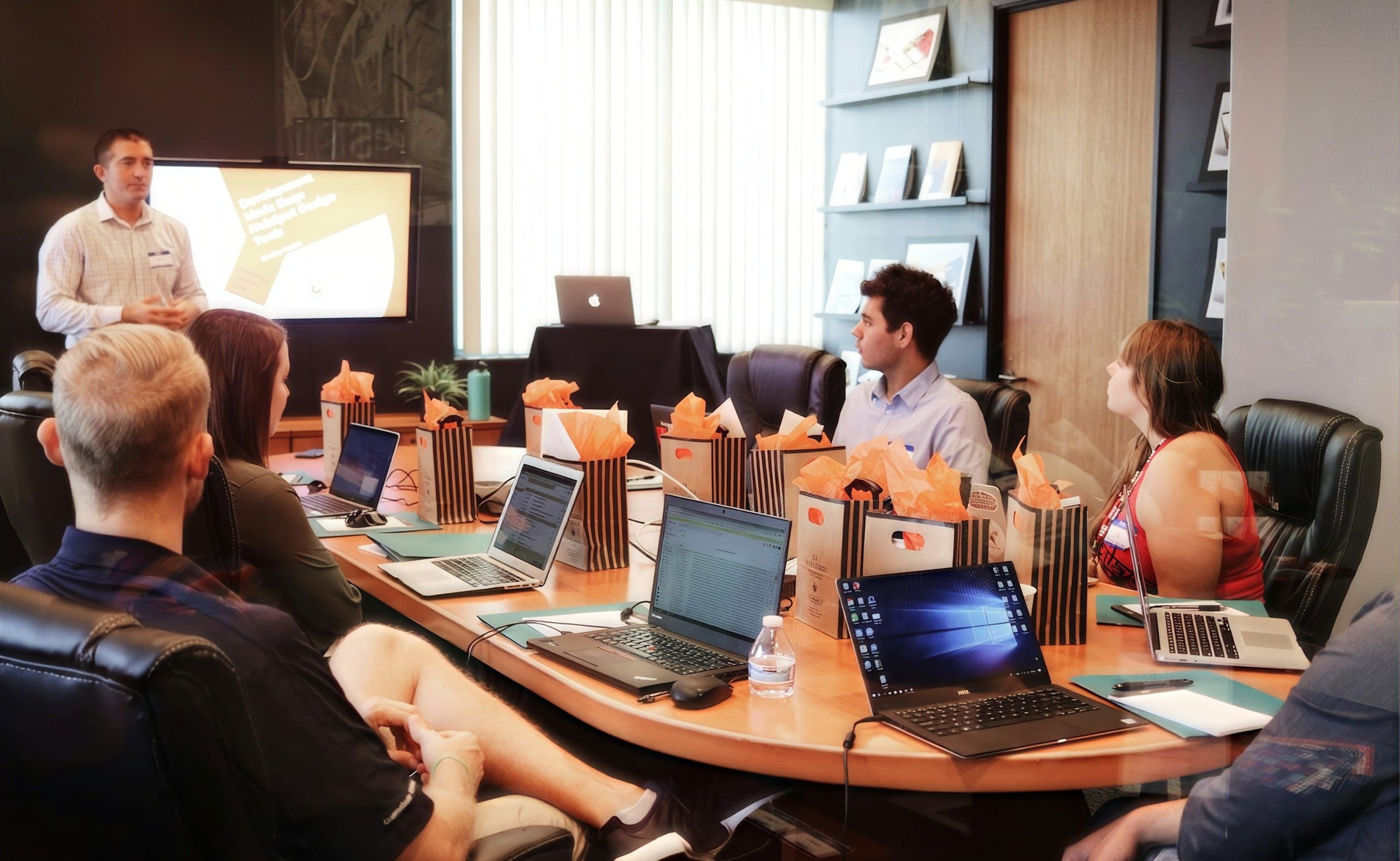 Team training session around a boardroom table