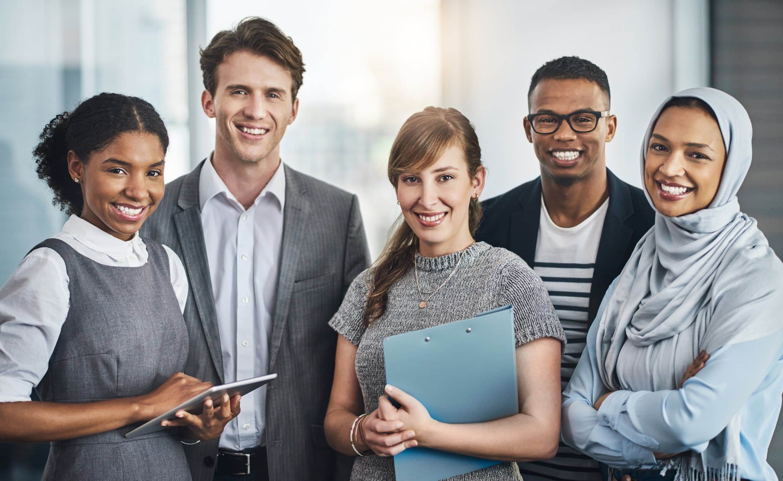 Group of smiling learners and professionals